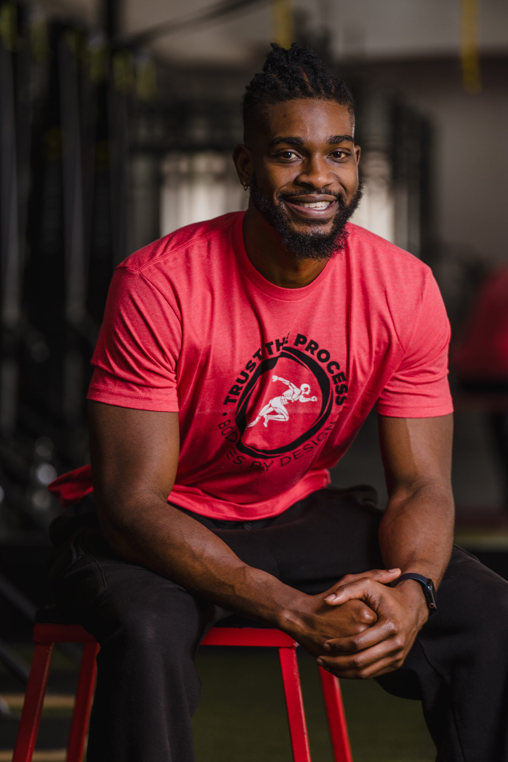 Pflugerville Personal Trainer, Jimmy, sitting and looking confidently into the camera.